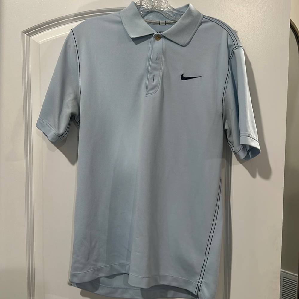 Small blue Nike golf polo